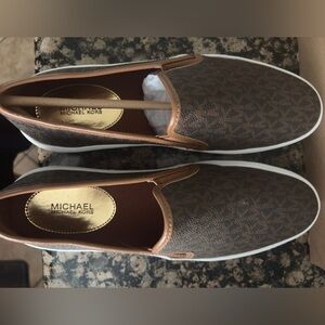 Michael Kors women’s Brown Slip-On Loafers